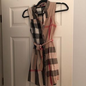 Designer inspired tunic. Never worn. One size.